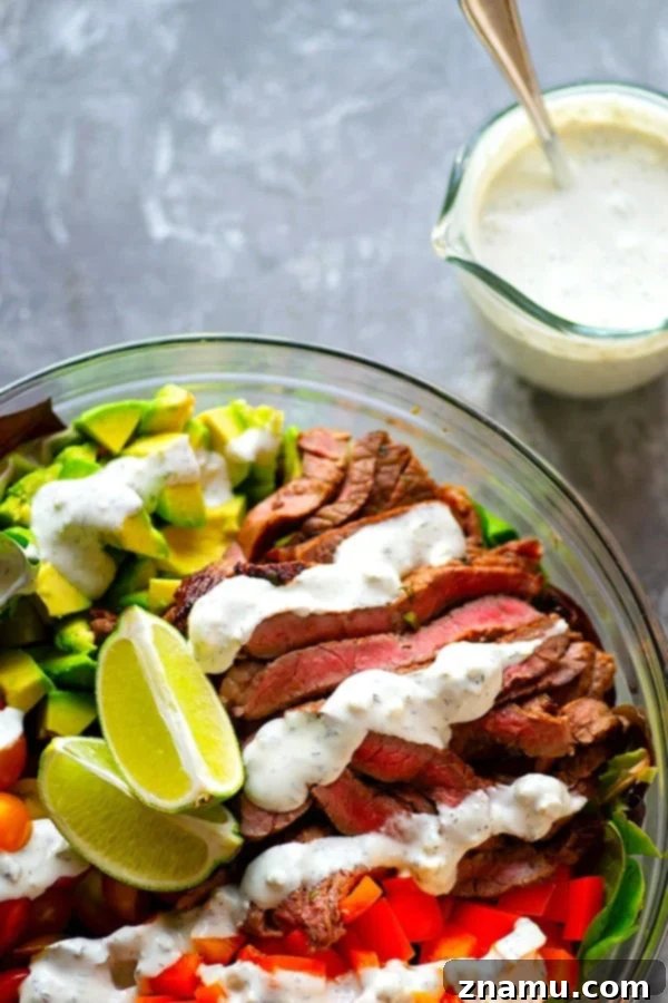 Hearty Carne Asada Bowls with Bold Bleu Cheese 4 Marinating flank steak in a vibrant jalapeno lime mixture, showcasing the rich colors of the marinade soaking into the meat.