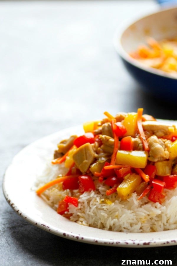 Aloha Teriyaki Chicken Skillet 4 Colorful Hawaiian Chicken Teriyaki Stir-Fry in a skillet, ready to be served.