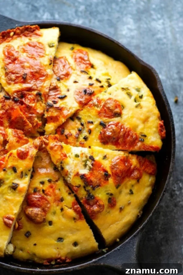 Warm slices of Jalapeno Cheddar Focaccia showing the perfectly melted cheese pockets
