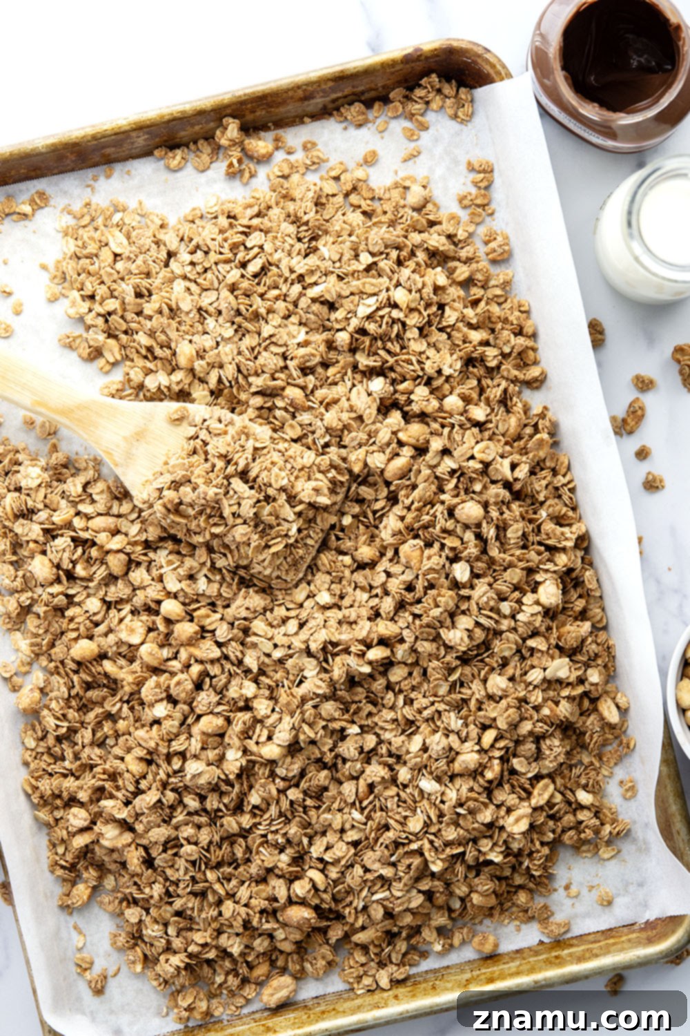 Swirled Peanut Butter Nutella Granola 2 Sweet nutella and creamy peanut butter are a dream pairing in this perfectly crunchy homemade peanut butter nutella granola.