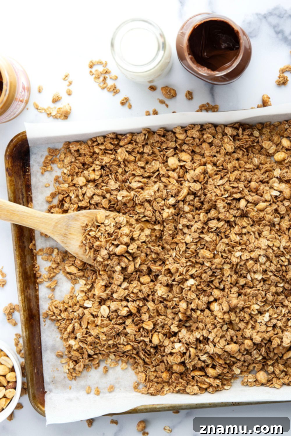 Swirled Peanut Butter Nutella Granola 3 Sweet nutella and creamy peanut butter are a dream pairing in this perfectly crunchy homemade peanut butter nutella granola.