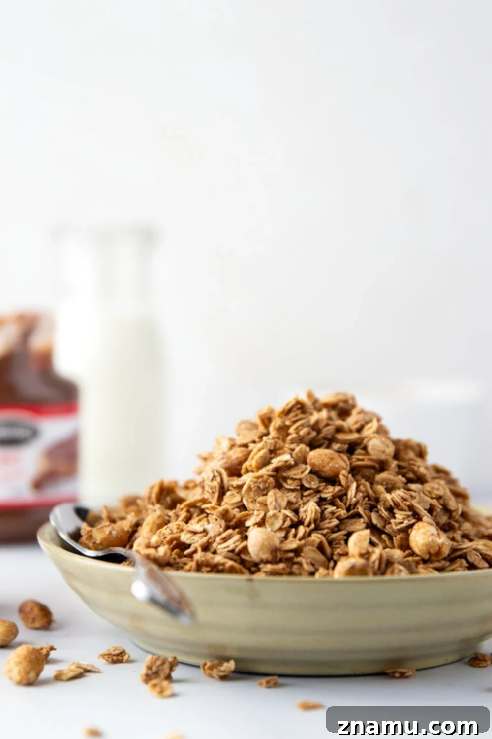 Swirled Peanut Butter Nutella Granola 4 Sweet nutella and creamy peanut butter are a dream pairing in this perfectly crunchy homemade peanut butter nutella granola.