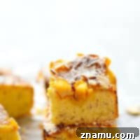 Lemon Curd Almond Butter Cake - A slice of this delightful cake, showcasing a perfect balance of lemon and almond flavors.