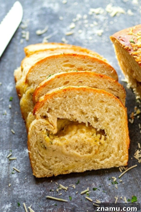 Roasted Garlic Asiago Twisted Loaf 4 Roasted Garlic Asiago Swirl Bread - Flavorful roasted garlic and sharp Asiago cheese are swirled into this incredibly soft and tender yeast bread.