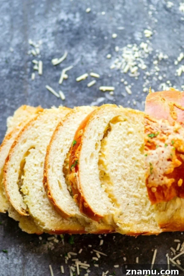 Roasted Garlic Asiago Twisted Loaf 5 Roasted Garlic Asiago Swirl Bread - Flavorful roasted garlic and sharp Asiago cheese are swirled into this incredibly soft and tender yeast bread.