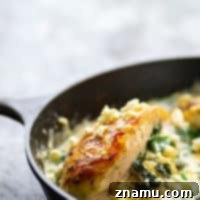 Creamy Spinach Feta Stuffed Skillet Chicken 7 Stuffed with a flavorful spinach feta filling and smothered in a creamy spinach sauce, these spinach feta stuffed chicken breasts look like fancy dinner food, but they are ready in under an hour with minimal ingredients!