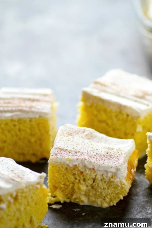 Heavenly Three-Milk Cake 2 A beautifully decorated classic tres leches cake, showcasing its moist texture and rich whipped cream topping.