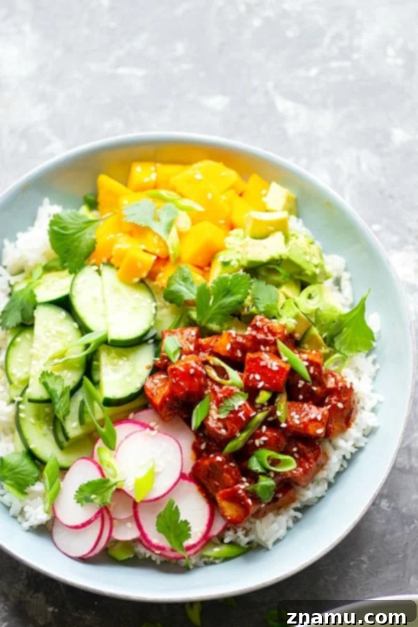 Close-up of fresh salmon and mango ready for poke bowls