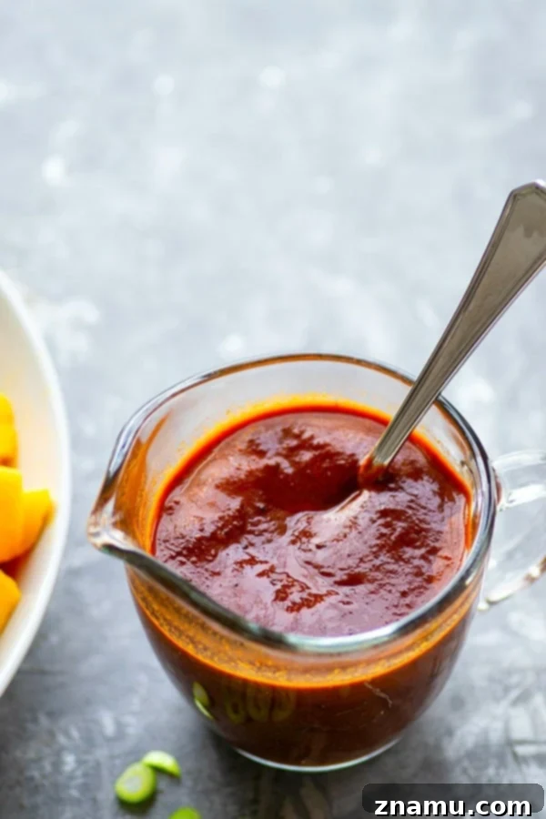 Spicy Ginger Mango Salmon Poke Bowls with flavorful sauce