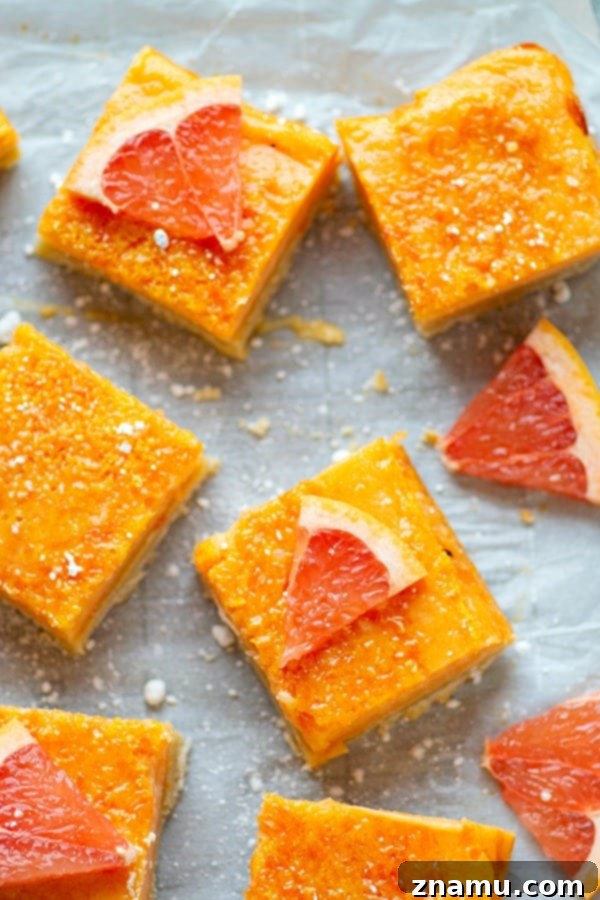 Sunshine Grapefruit Shortbread 3 Close-up of Shortbread Grapefruit Bars, showcasing the vibrant filling