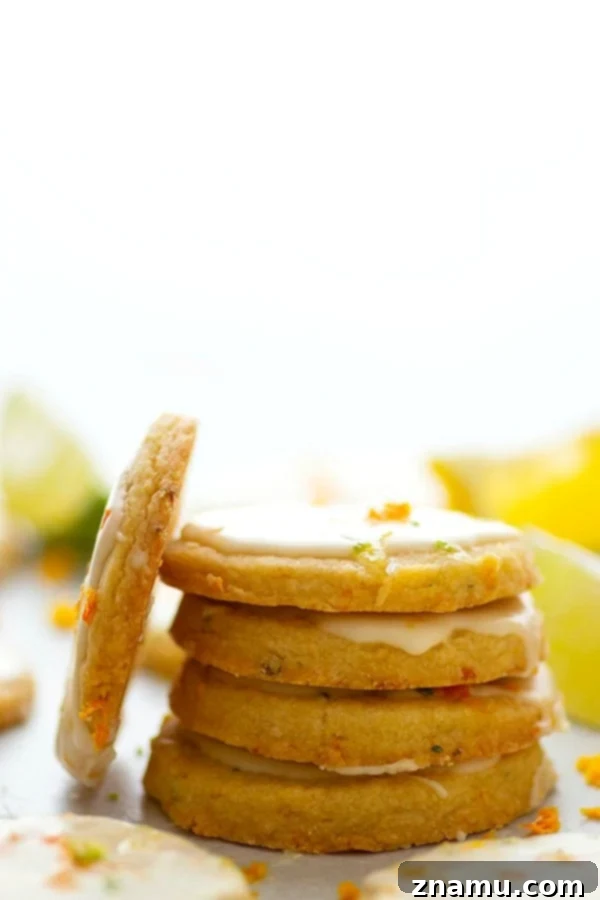 Zesty Brown Butter Shortbread 2 Delightful Citrus Browned Butter Shortbread Cookies with a vibrant glaze, perfect for a springtime cookie tray.