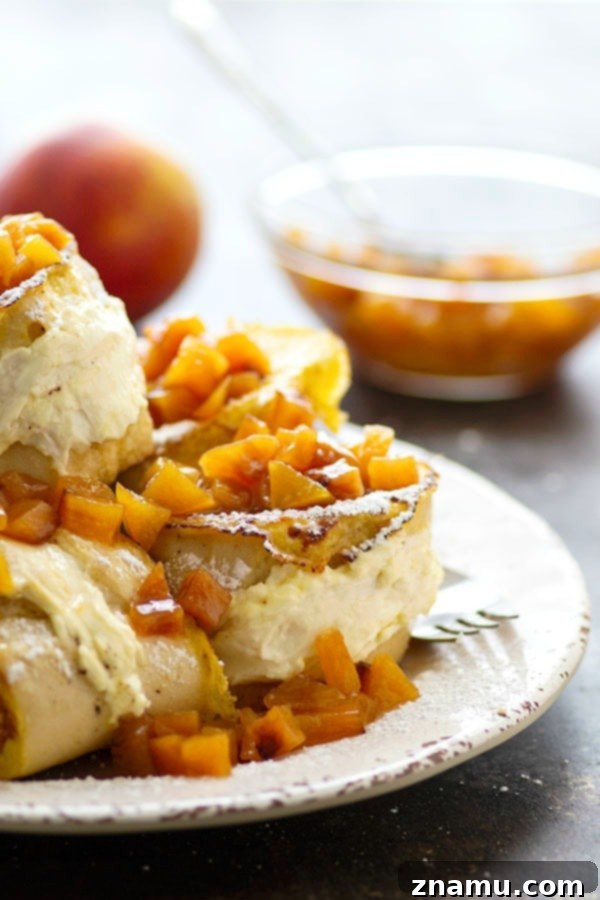 Peaches and Cream Cheese Stuffed French Toast 3 Stuffed with a tangy cream cheese filling and topped with a sweet peach compote, this stuffed french toast is a stunner for any brunch and on the table in minutes!