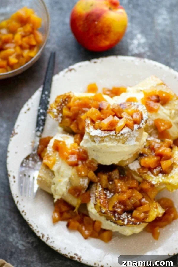 Peaches and Cream Cheese Stuffed French Toast 4 Stuffed with a tangy cream cheese filling and topped with a sweet peach compote, this stuffed french toast is a stunner for any brunch and on the table in minutes!