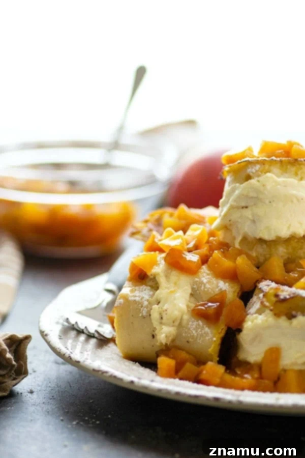 Peaches and Cream Cheese Stuffed French Toast 5 Stuffed with a tangy cream cheese filling and topped with a sweet peach compote, this stuffed french toast is a stunner for any brunch and on the table in minutes!