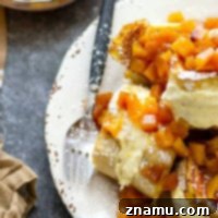 Stuffed with a tangy cream cheese filling and topped with a sweet peach compote, this stuffed french toast is a stunner for any brunch and on the table in minutes!