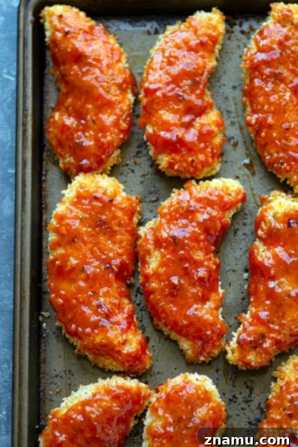 Hawaiian Baked BBQ Chicken Strips 3 Super crispy and coated in a sweet pineapple barbecue sauce, these Hawaiian-style oven baked BBQ chicken tenders will become an instant weeknight dinner hit!