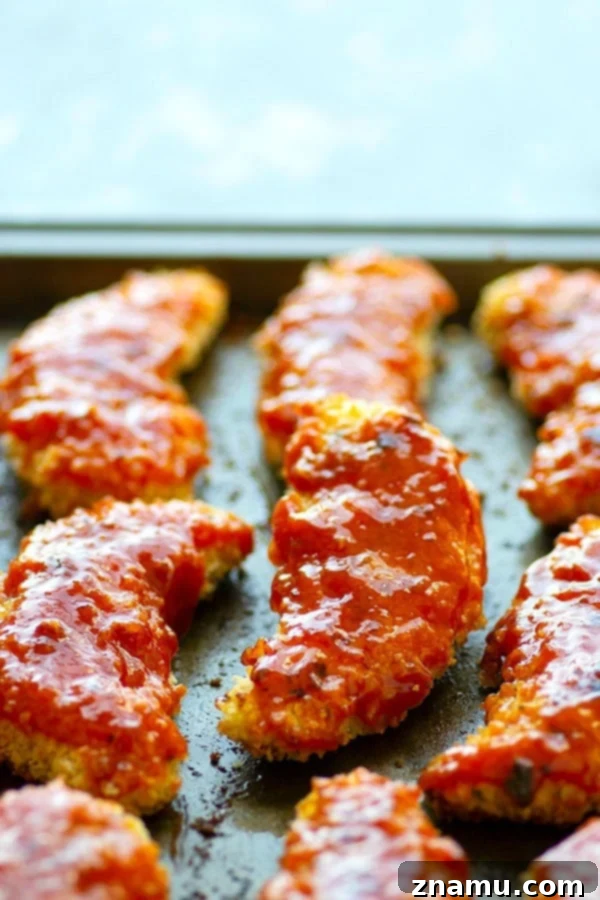 Hawaiian Baked BBQ Chicken Strips 5 Super crispy and coated in a sweet pineapple barbecue sauce, these Hawaiian-style oven baked BBQ chicken tenders will become an instant weeknight dinner hit!
