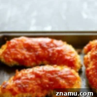 Hawaiian Baked BBQ Chicken Strips 7 Super crispy and coated in a sweet pineapple barbecue sauce, these Hawaiian-style oven baked BBQ chicken tenders will become an instant weeknight dinner hit!