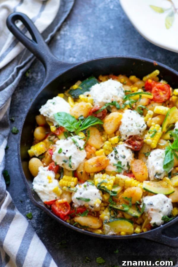 Crispy Pan-Fried Gnocchi with Smoky Corn, Burst Tomatoes & Herbed Ricotta 3 Crispy pan-fried gnocchi is loaded with sweet charred corn, juicy cherry tomatoes, and creamy herbed ricotta for an easy 30-minute dinner just brimming with summer goodness!