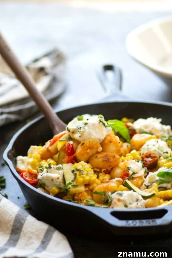 Crispy Pan-Fried Gnocchi with Smoky Corn, Burst Tomatoes & Herbed Ricotta 4 Crispy pan-fried gnocchi is loaded with sweet charred corn, juicy cherry tomatoes, and creamy herbed ricotta for an easy 30-minute dinner just brimming with summer goodness!