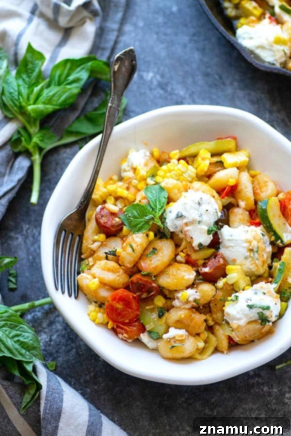 Crispy Pan-Fried Gnocchi with Smoky Corn, Burst Tomatoes & Herbed Ricotta 5 Crispy pan-fried gnocchi is loaded with sweet charred corn, juicy cherry tomatoes, and creamy herbed ricotta for an easy 30-minute dinner just brimming with summer goodness!