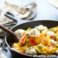 Crispy Pan-Fried Gnocchi with Smoky Corn, Burst Tomatoes & Herbed Ricotta 7 Crispy pan-fried gnocchi is loaded with sweet charred corn, juicy cherry tomatoes, and creamy herbed ricotta for an easy 30-minute dinner just brimming with summer goodness!