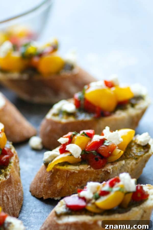 Sun-Kissed Pepper Pesto & Creamy Chèvre Crostini 4 Tender roasted red peppers coupled with flavorful pesto and creamy goat cheese are an incredible flavor trio in this goat cheese bruschetta that's super impressive, incredibly easy, and perfect for entertaining!