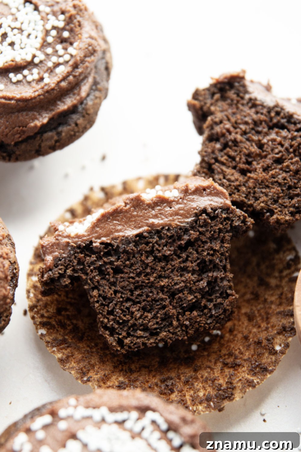 Decadent Double Chocolate Cupcakes 6 Rich and moist chocolate cupcakes with chocolate buttercream frosting are easy to make at home and perfect for any cake occasion!