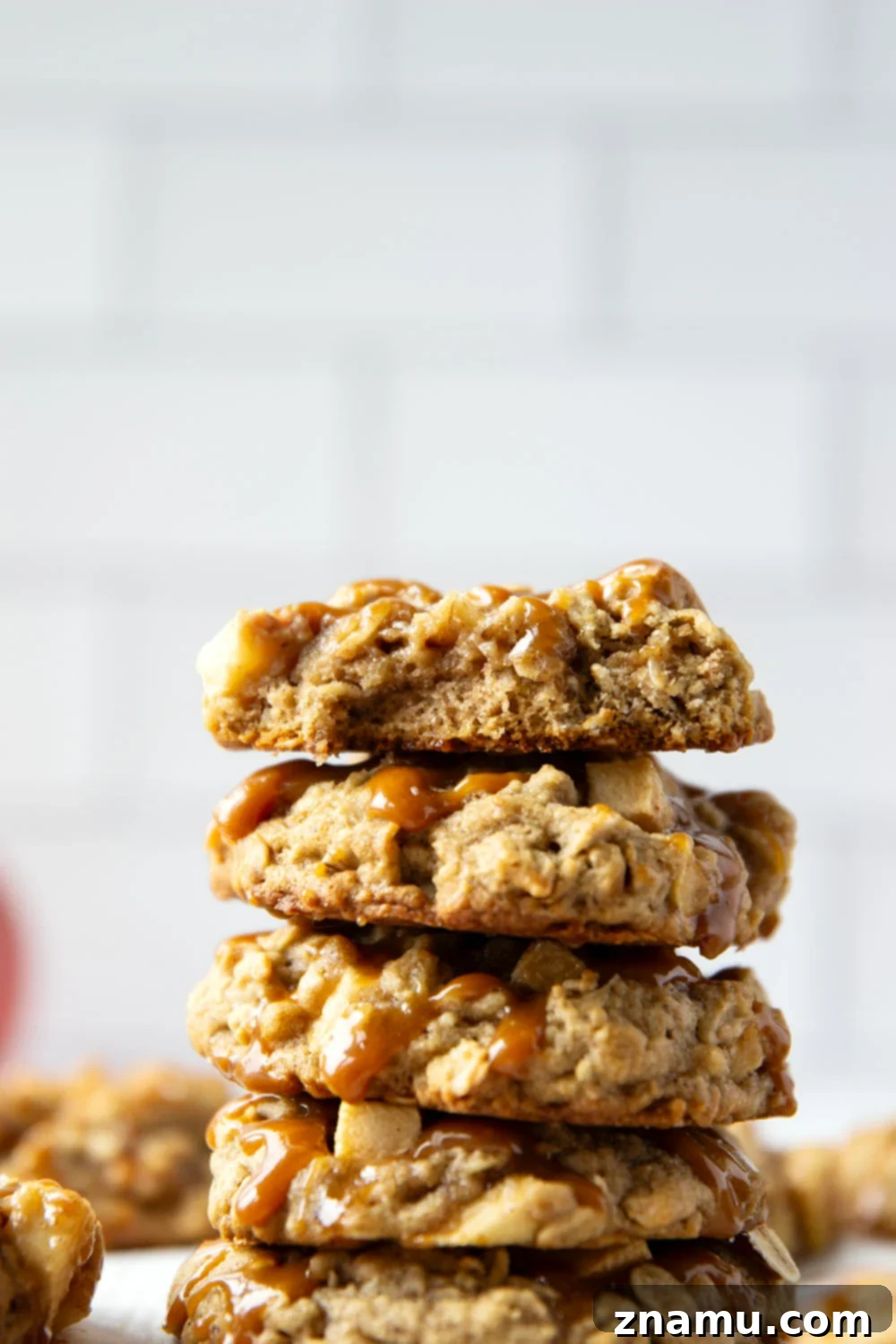 Salted Caramel Apple Oatmeal Cookies 5 Ingredients for caramel apple oatmeal cookies laid out, including diced apples