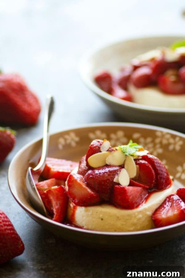 Velvety Greek Yogurt Panna Cotta with Honey-Kissed Strawberries 2 Silky greek yogurt panna cotta is piled high with juicy honey roasted strawberries for a luxurious no-bake summer dessert!
