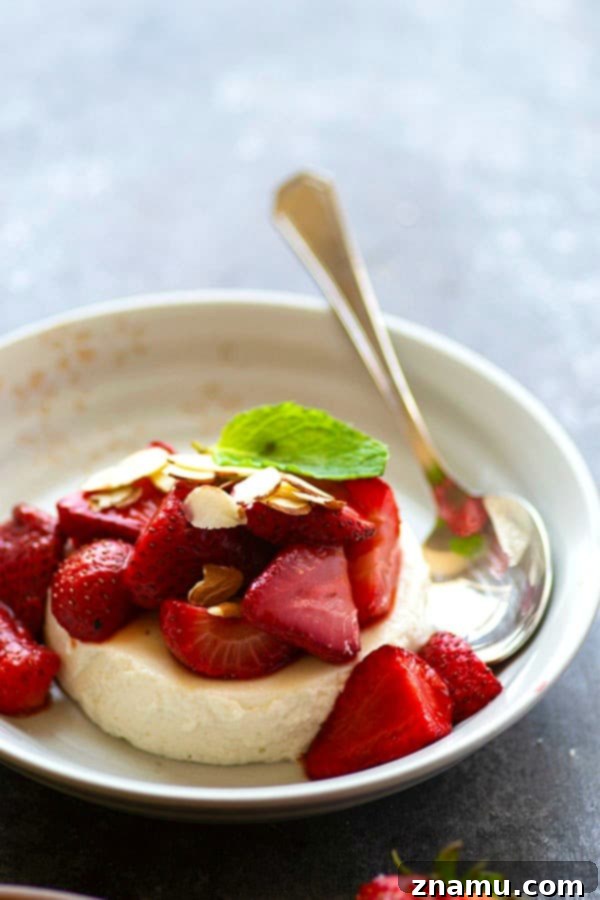 Velvety Greek Yogurt Panna Cotta with Honey-Kissed Strawberries 4 Silky greek yogurt panna cotta is piled high with juicy honey roasted strawberries for a luxurious no-bake summer dessert!