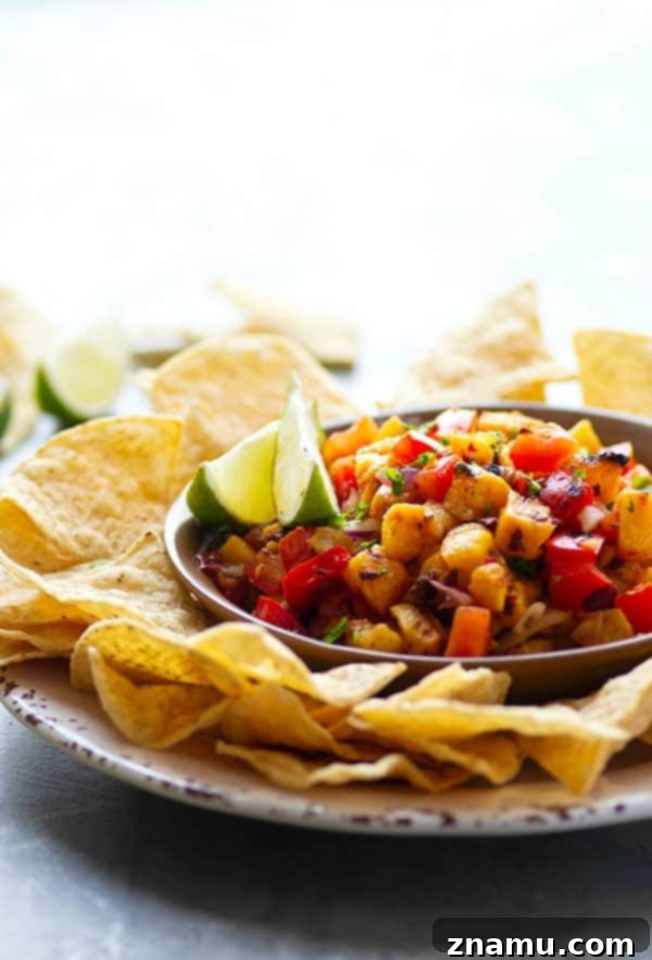 Sweet Heat Chipotle Pineapple Salsa 2 Sweet grilled pineapple and smoky chipotle pepper take this addicting grilled pineapple salsa to an incredible level of flavors! Serve with your favorite chips, on tacos, or over grilled meat.