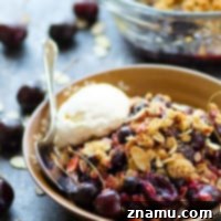 Flavorful browned butter and toasty almonds transform this luscious blueberry cherry crisp into an incredible dessert. Serve with plenty of vanilla ice cream for the perfect summer treat.