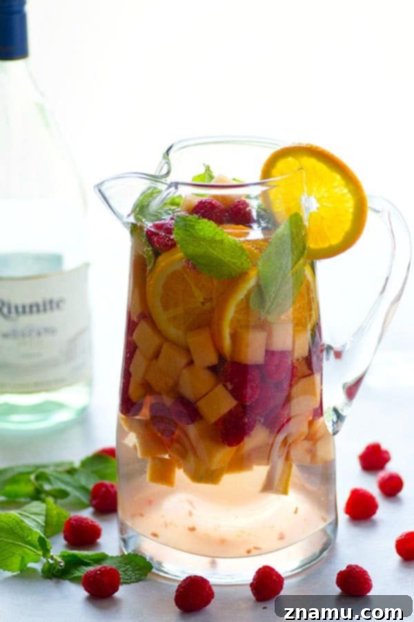 Refreshing Cantaloupe Raspberry Mint Moscato Sangria 4 Sweet moscato sangria is livened up with the addition of fresh cantaloupe, tangy raspberries, and refreshing mint leaves.