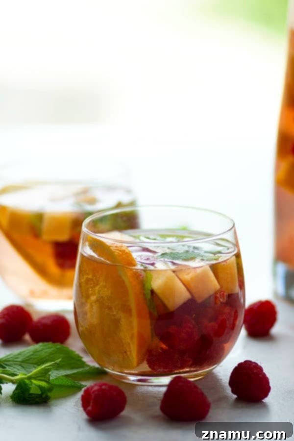Refreshing Cantaloupe Raspberry Mint Moscato Sangria 5 Sweet moscato sangria is livened up with the addition of fresh cantaloupe, tangy raspberries, and refreshing mint leaves.