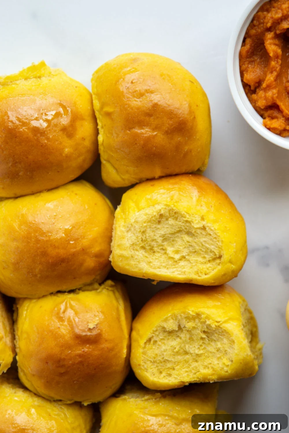 Warm Spiced Pumpkin Rolls 4 Close-up of pumpkin puree, a key ingredient for moist and flavorful dinner rolls
