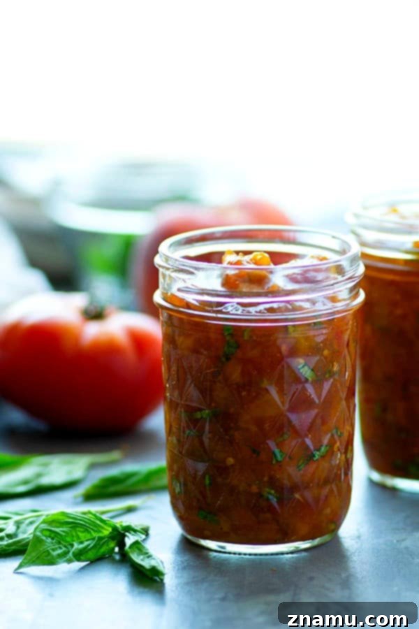Basil Peach Heirloom Tomato Jam 4 Fresh basil and juicy sweet peaches add the perfect summer touch to this heirloom tomato jam! Wonderful spread on a toasted baguette and an incredible condiment for a charcuterie board.