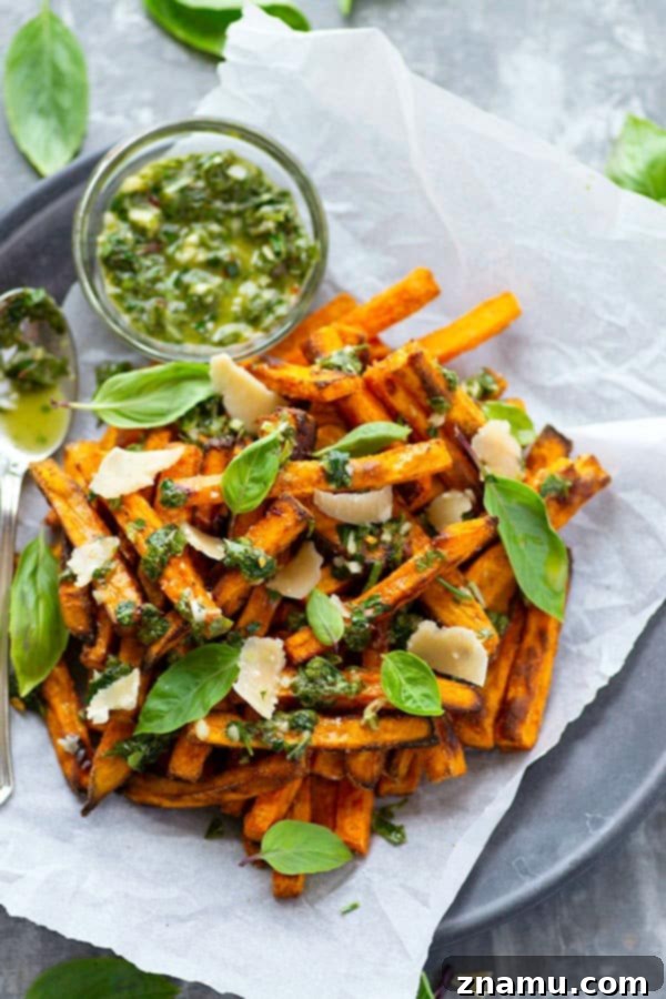 Basil Chimichurri Sweet Potato Crunch 4 Perfectly crispy baked sweet potato fries are drizzled in a flavorful basil chimichurri sauce and topped with Parmesan cheese shards for a healthier appetizer or side dish!