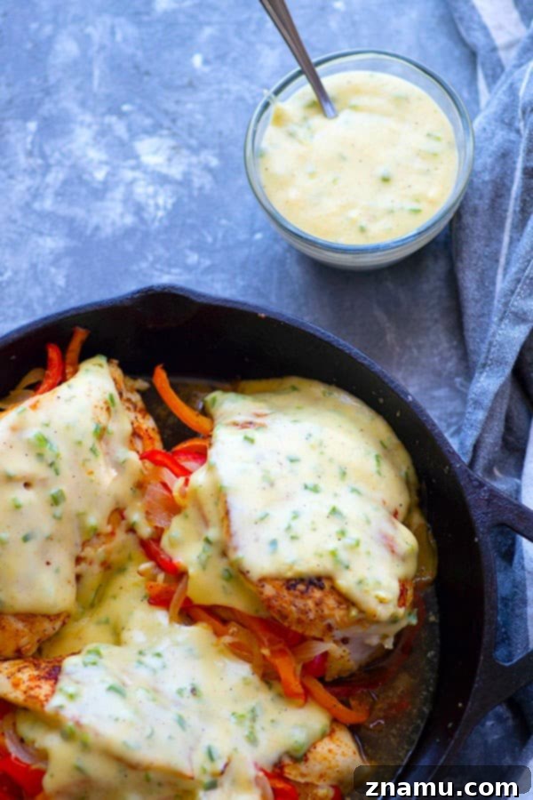 Spicy Fajita-Stuffed Chicken with Creamy Queso 5 Finished Fajita Stuffed Chicken with generous amounts of Jalapeno Queso, ready to be served