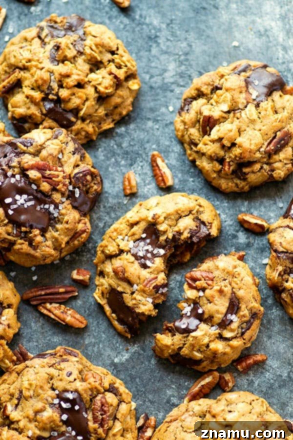 Rustic Dark Chocolate Pecan Oatmeal Cookies 4 Gooey dark chocolate, toasty pecans, tender oats, and a sprinkle of sea salt take these pecan oatmeal cookies to the next level! Comes together in one bowl with NO dough chilling required.
