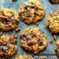 Rustic Dark Chocolate Pecan Oatmeal Cookies 7 Gooey dark chocolate, toasty pecans, tender oats, and a sprinkle of sea salt take these pecan oatmeal cookies to the next level! Comes together in one bowl with NO dough chilling required.