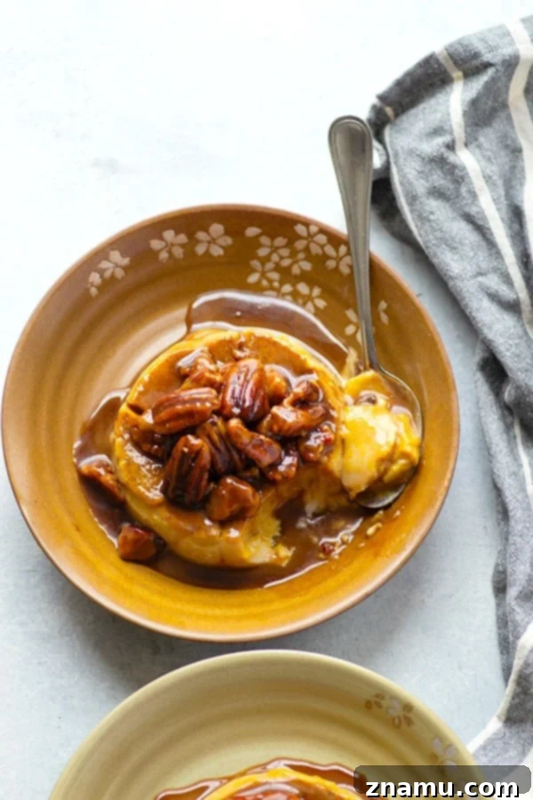 Autumn Spice Panna Cotta with Salted Pecan Caramel 2 Two pumpkin panna cottas in glass ramekins, perfectly set and ready for topping.