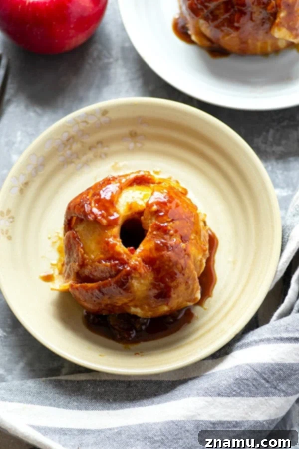 Golden Apple Dumplings with Brown Butter Salted Caramel 3 Homemade apple dumplings are baked in an incredible browned butter salted caramel sauce to create one stunning dessert for fall!