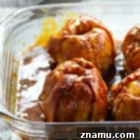 Homemade apple dumplings are baked in an incredible browned butter salted caramel sauce to create one stunning dessert for fall!