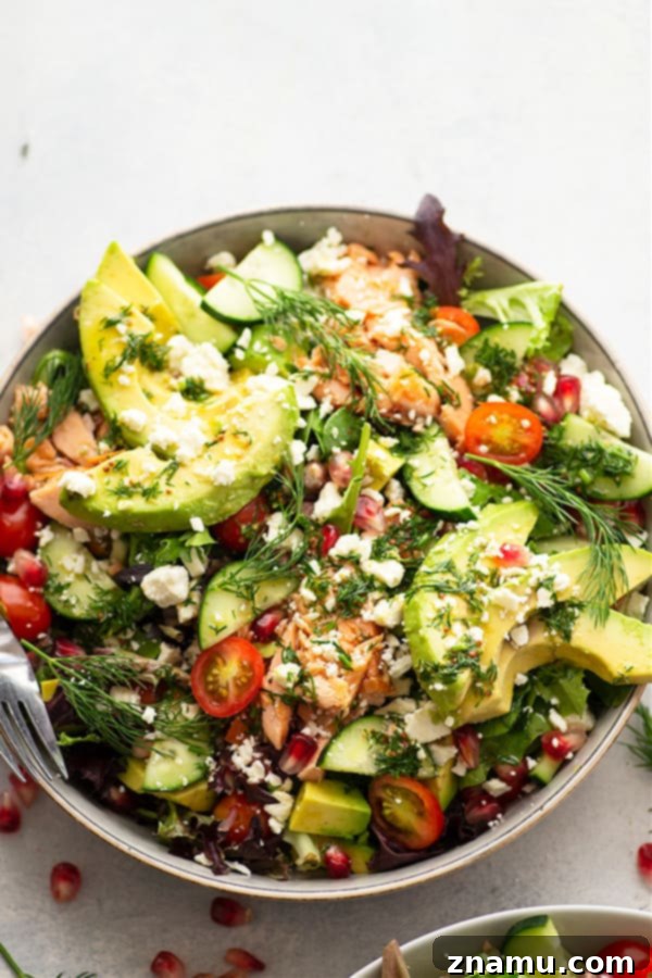 Smoky Salmon and Creamy Avocado Salad with Tangy Honey Dijon 4 Components of Smoked Salmon and Avocado Salad laid out, ready for assembly, highlighting fresh dill, feta cheese, and smoked salmon slices.
