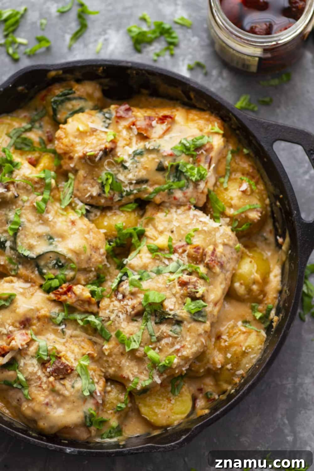 One-Pan Creamy Tuscan Salmon and Potatoes 5 Creamy Tuscan Salmon and Baby Potatoes in a skillet, ready to serve.