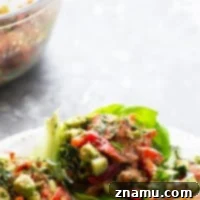 Smoked salmon lettuce wraps feature a fresh smoked salmon + veggie filling and a flavorful garlic walnut pesto tucked into crisp butter lettuce leaves. Easy to meal prep for lunch all week!