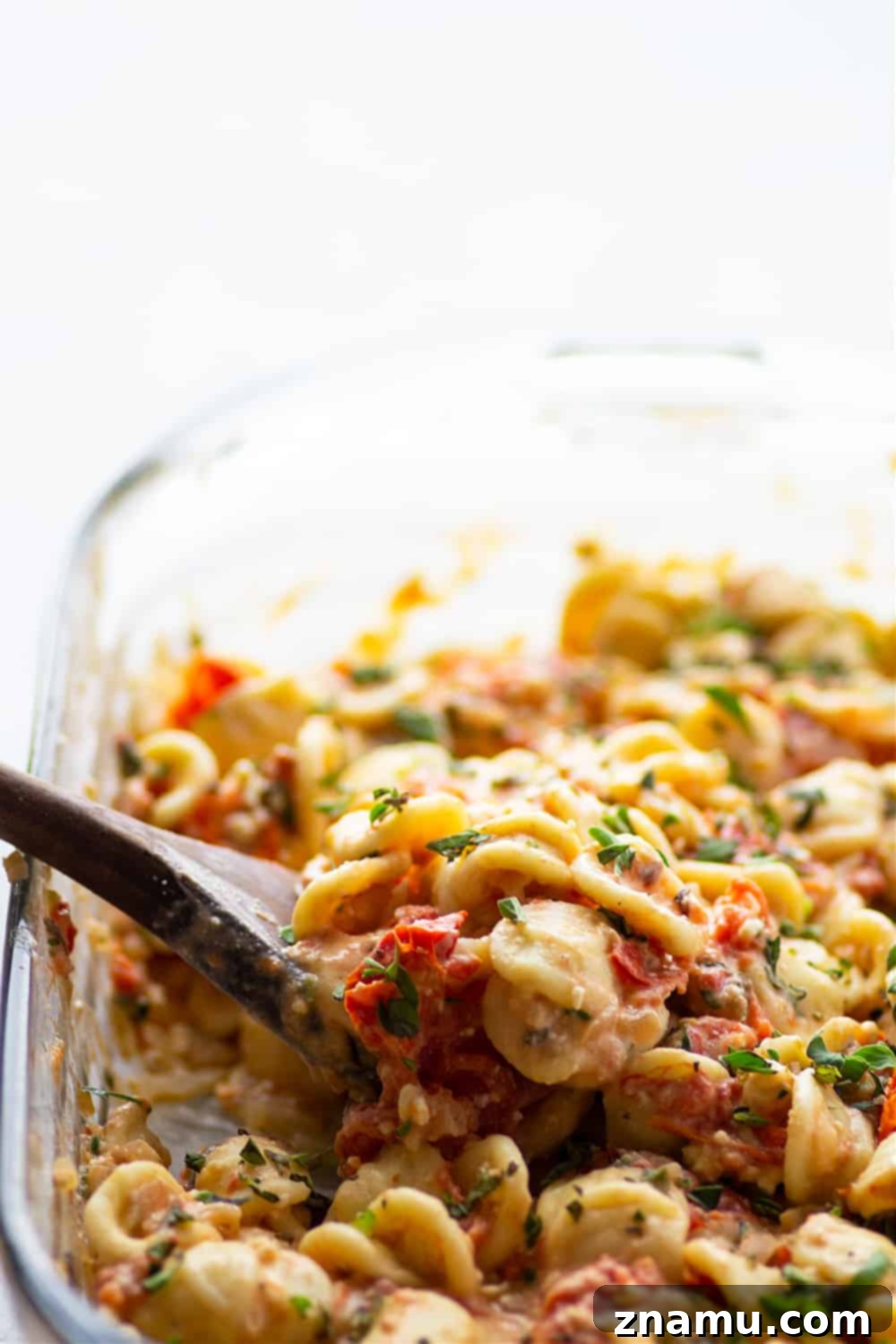 Effortless Feta Pasta Bake 3 Baked feta and herby bursting cherry tomatoes cook down into the most luxurious creamy sauce EVER for pasta! Inspired from the viral TikTok recipe, this baked feta pasta will quickly become a dinner regular!