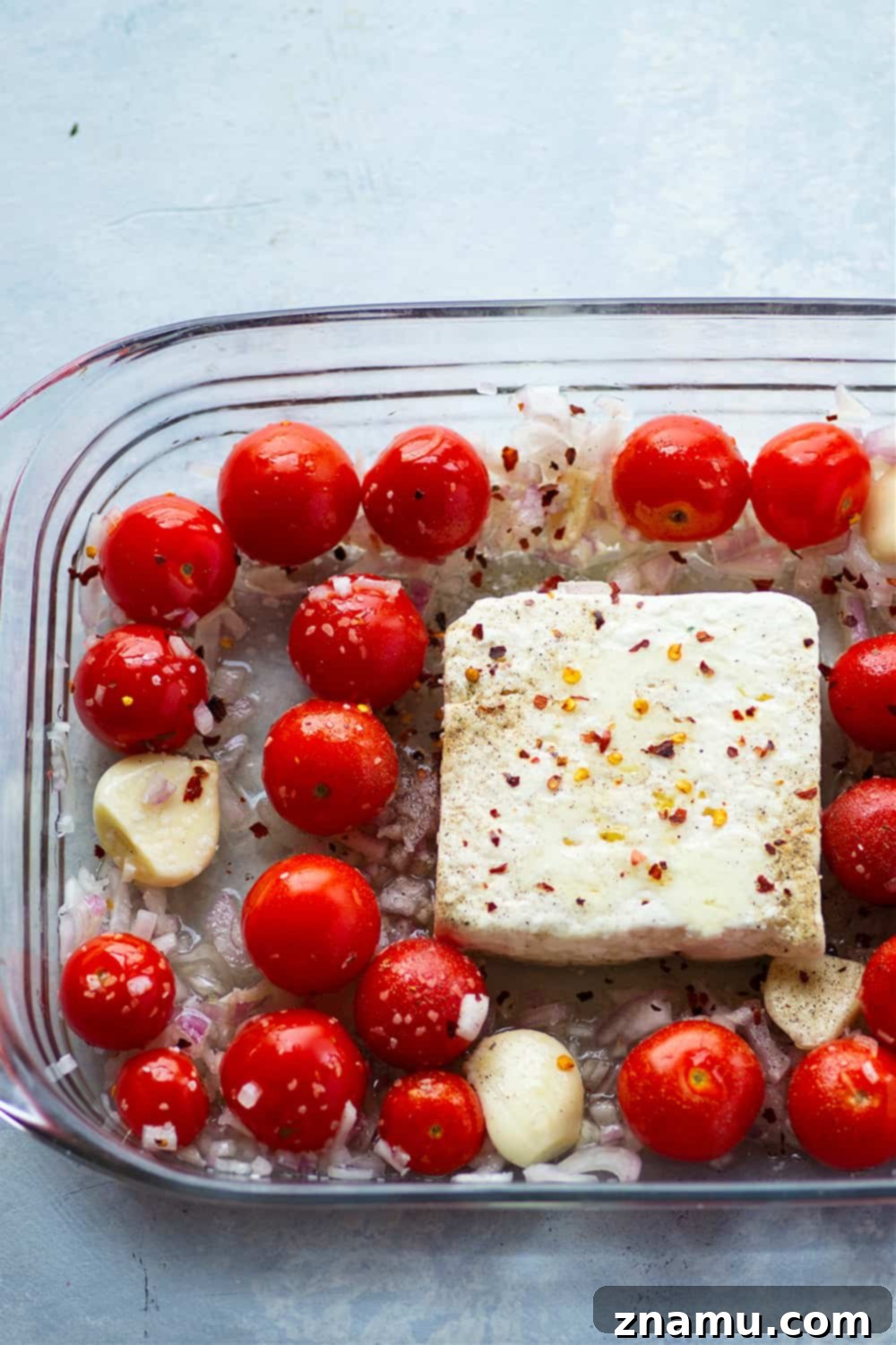 Effortless Feta Pasta Bake 5 Baked feta and herby bursting cherry tomatoes cook down into the most luxurious creamy sauce EVER for pasta! Inspired from the viral TikTok recipe, this baked feta pasta will quickly become a dinner regular!