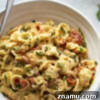 Effortless Feta Pasta Bake 9 Baked feta and herby bursting cherry tomatoes cook down into the most luxurious creamy sauce EVER for pasta! Inspired from the viral TikTok recipe, this baked feta pasta will quickly become a dinner regular!